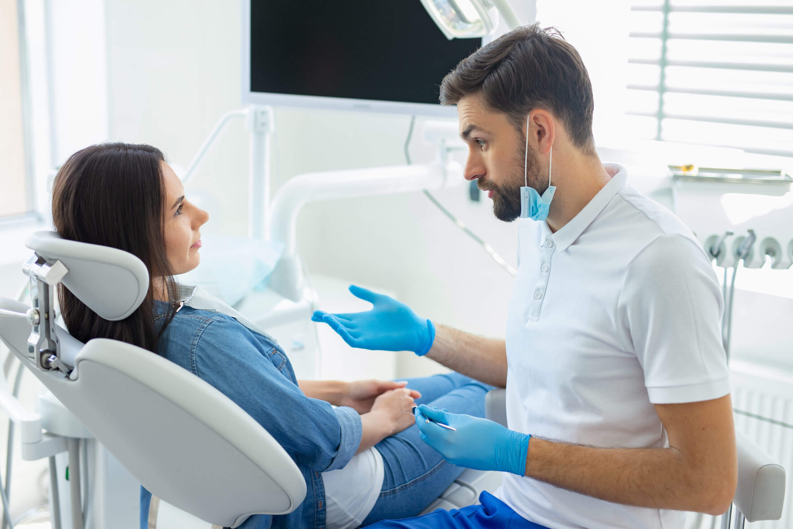 Patient talking to dentist about dental anxiety
