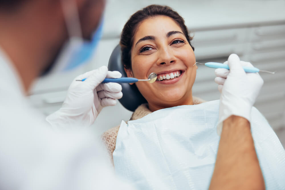 Woman receiving routine dental care