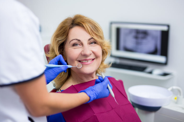 Adult woman having wisdom teeth removed