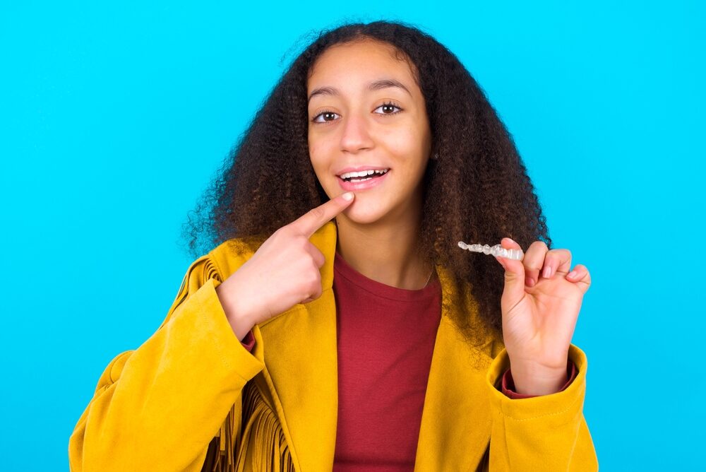 Teenager with an invisalign